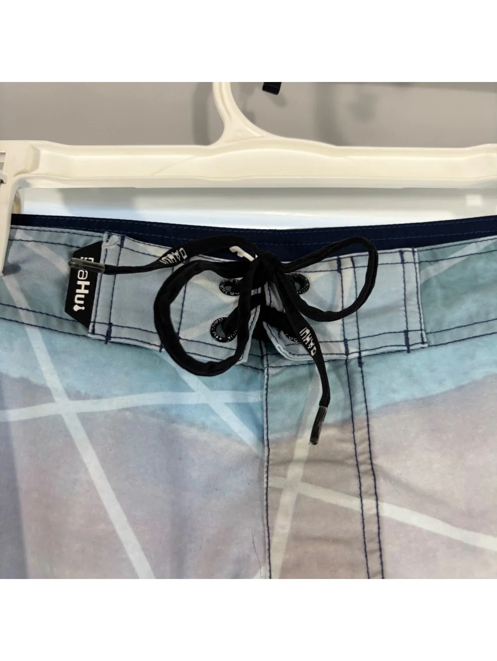 Blue striped Huk board shorts